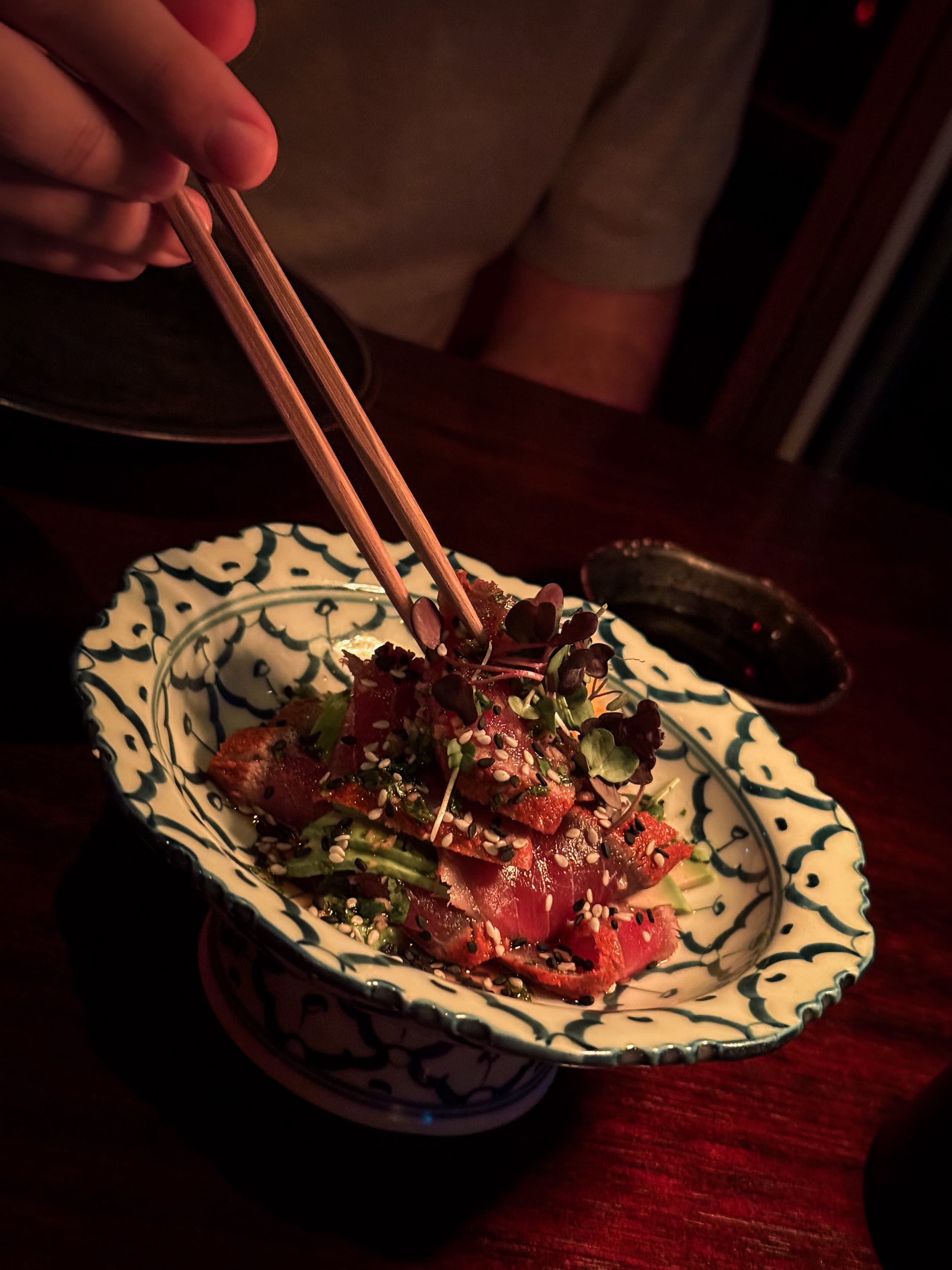Artisanal ceviche with premium presentation - signature dish that commands premium pricing and drives social media engagement